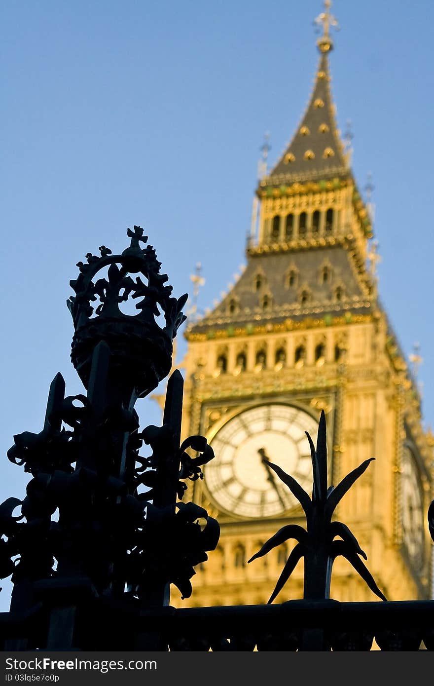 Grille of the Houses of Parliament on the background of Big Ben clock tower in the sunset. Grille of the Houses of Parliament on the background of Big Ben clock tower in the sunset.