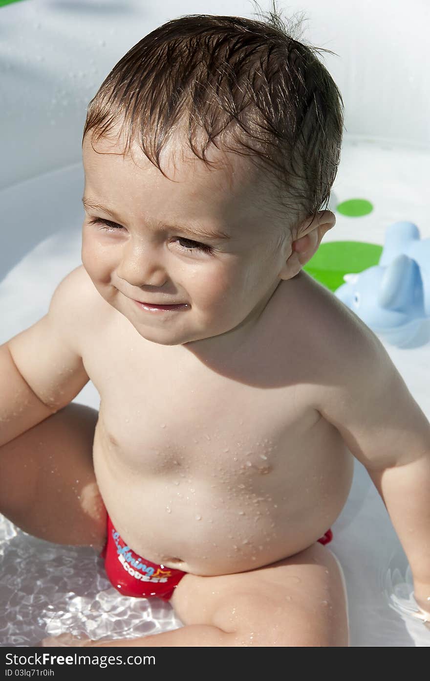 Child has fun in the pool