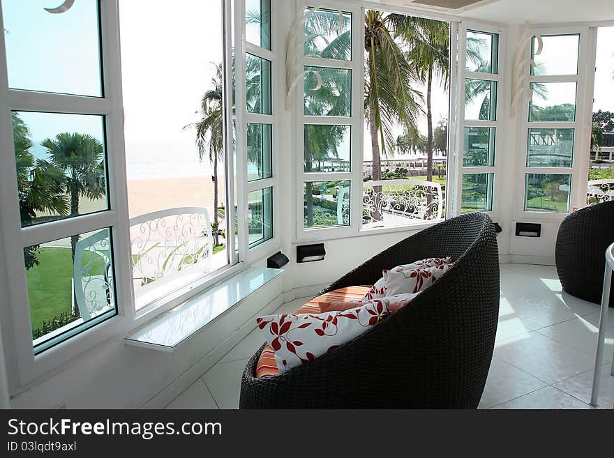 The Rattan chairs with colorful cushions.