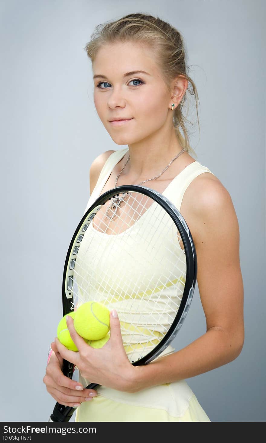 Girl with a tennis racket