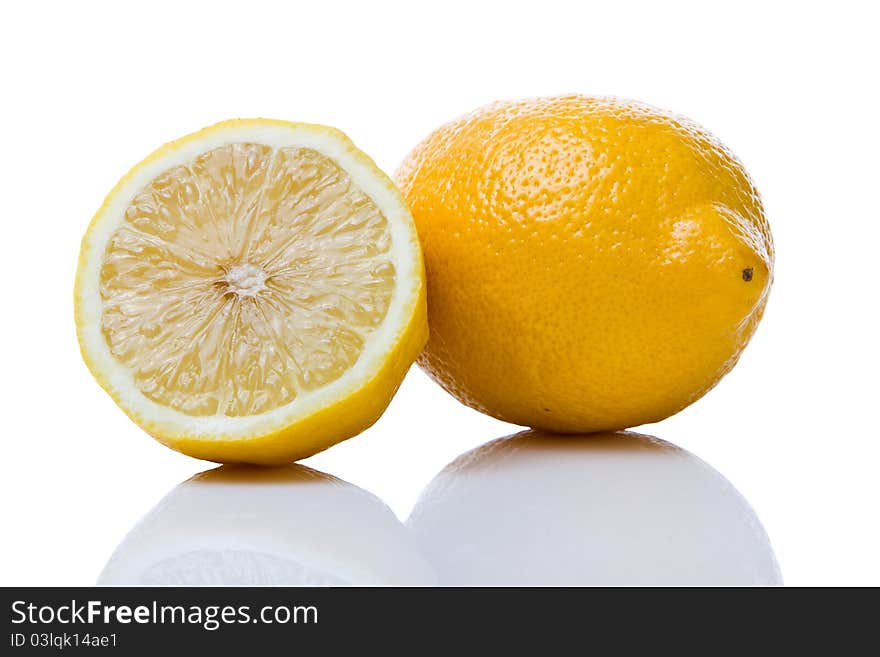 Two lemons isolated on white background