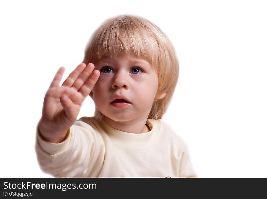 The little girl in a dress with arm outstretched on a white background