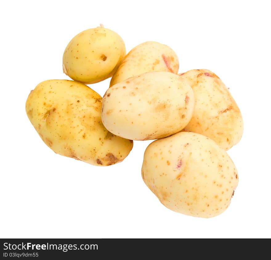 Fresh potatoes on a white