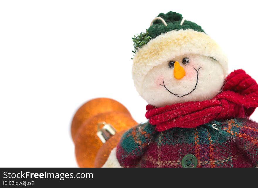 Smiling snowman toy isolated on white background