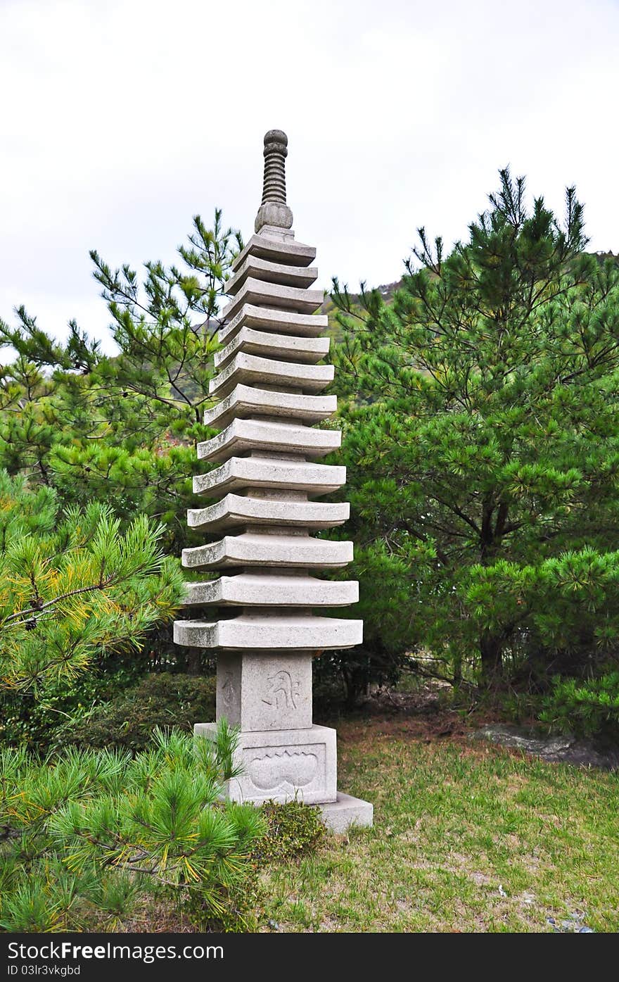 Stone statue in the Japanese garden