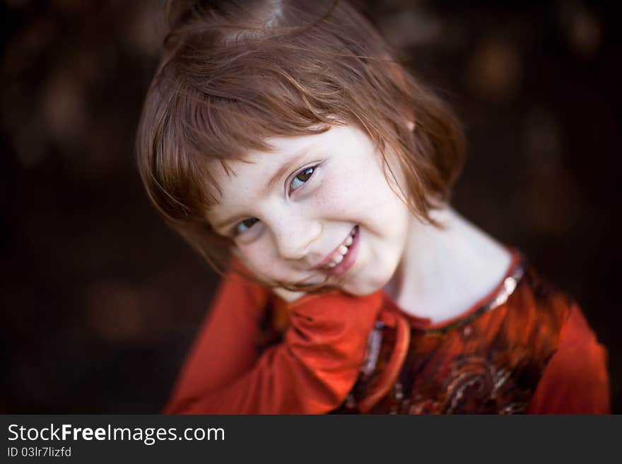 Portrait of red hair smilling girl