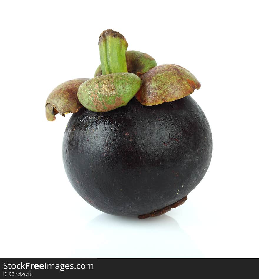 Single mangosteen on white background