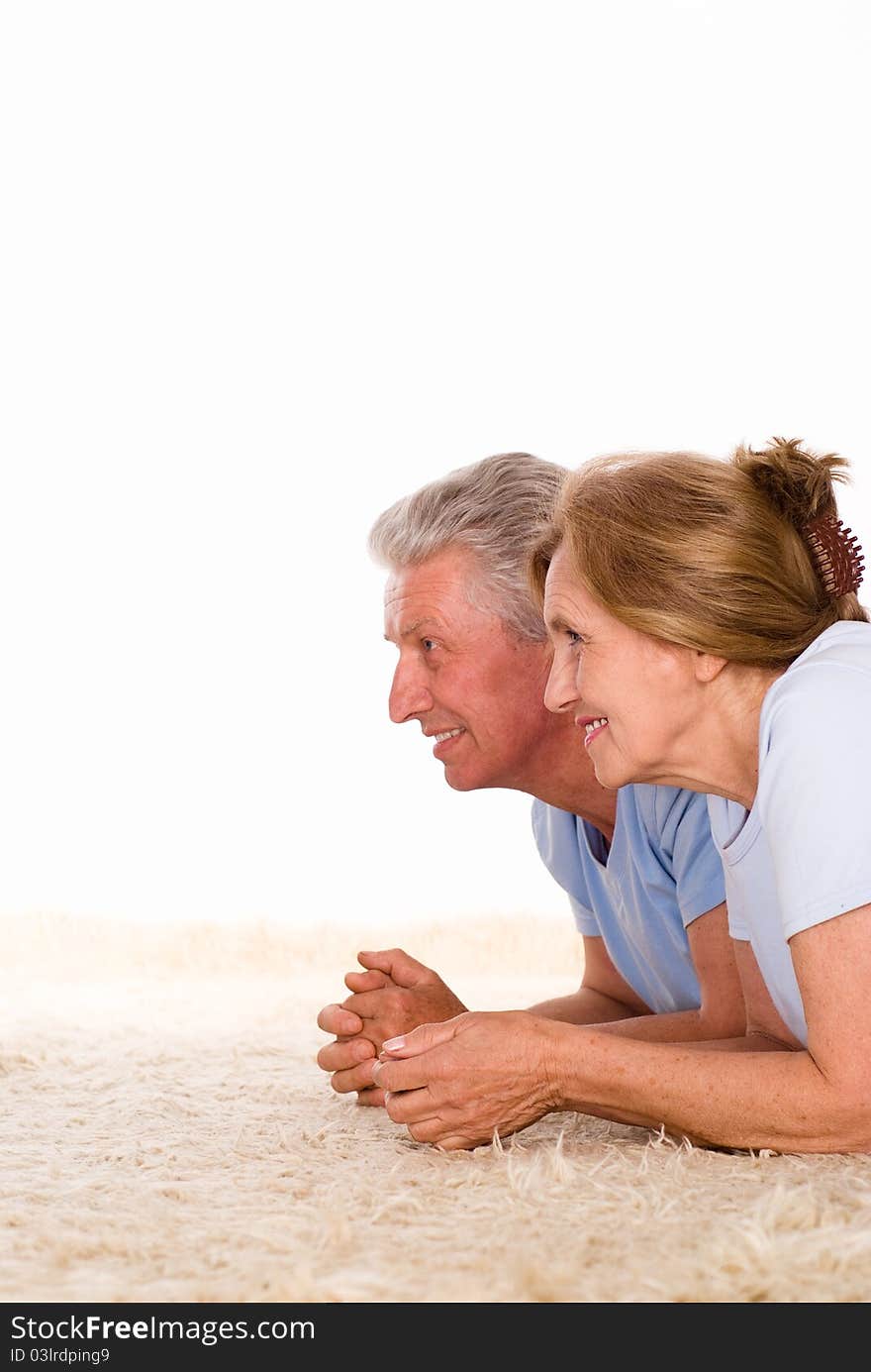 Happy elderly couple on a white background. Happy elderly couple on a white background