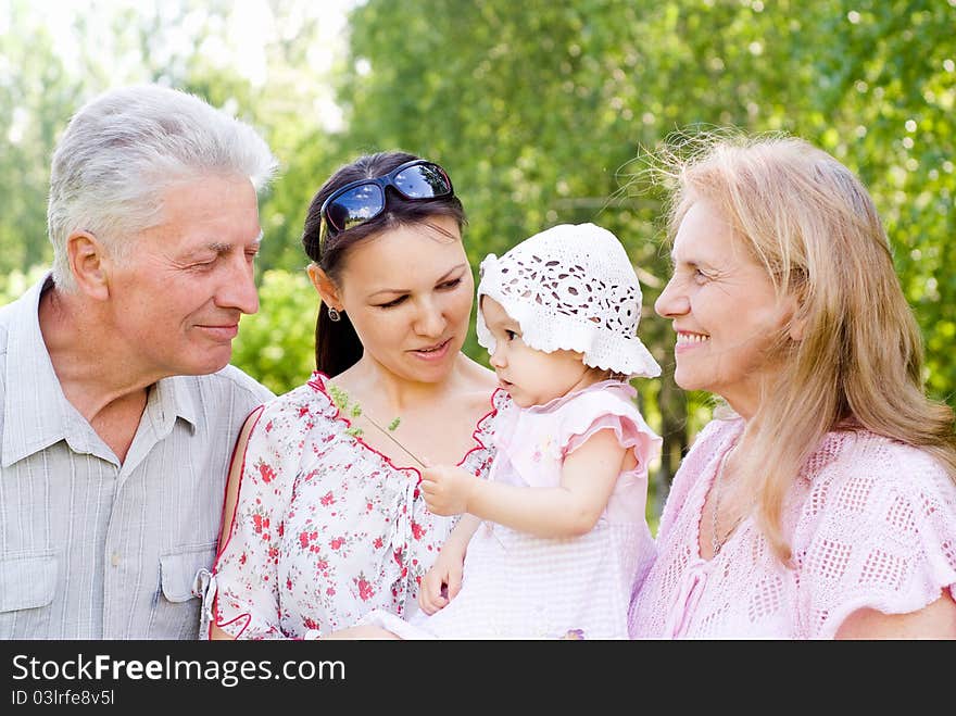 Nice family of a four at nature