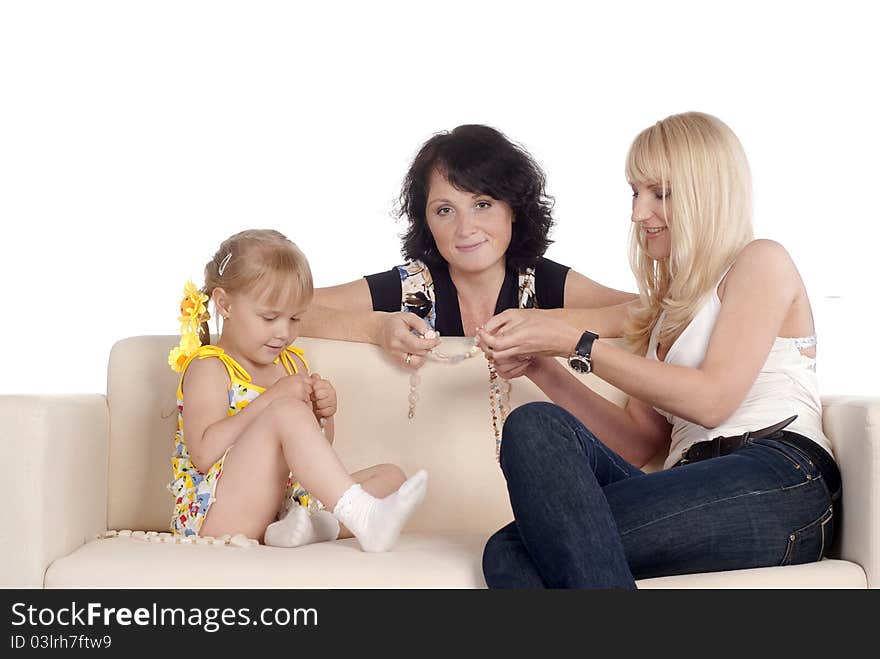 Family of a three posing on sofa. Family of a three posing on sofa