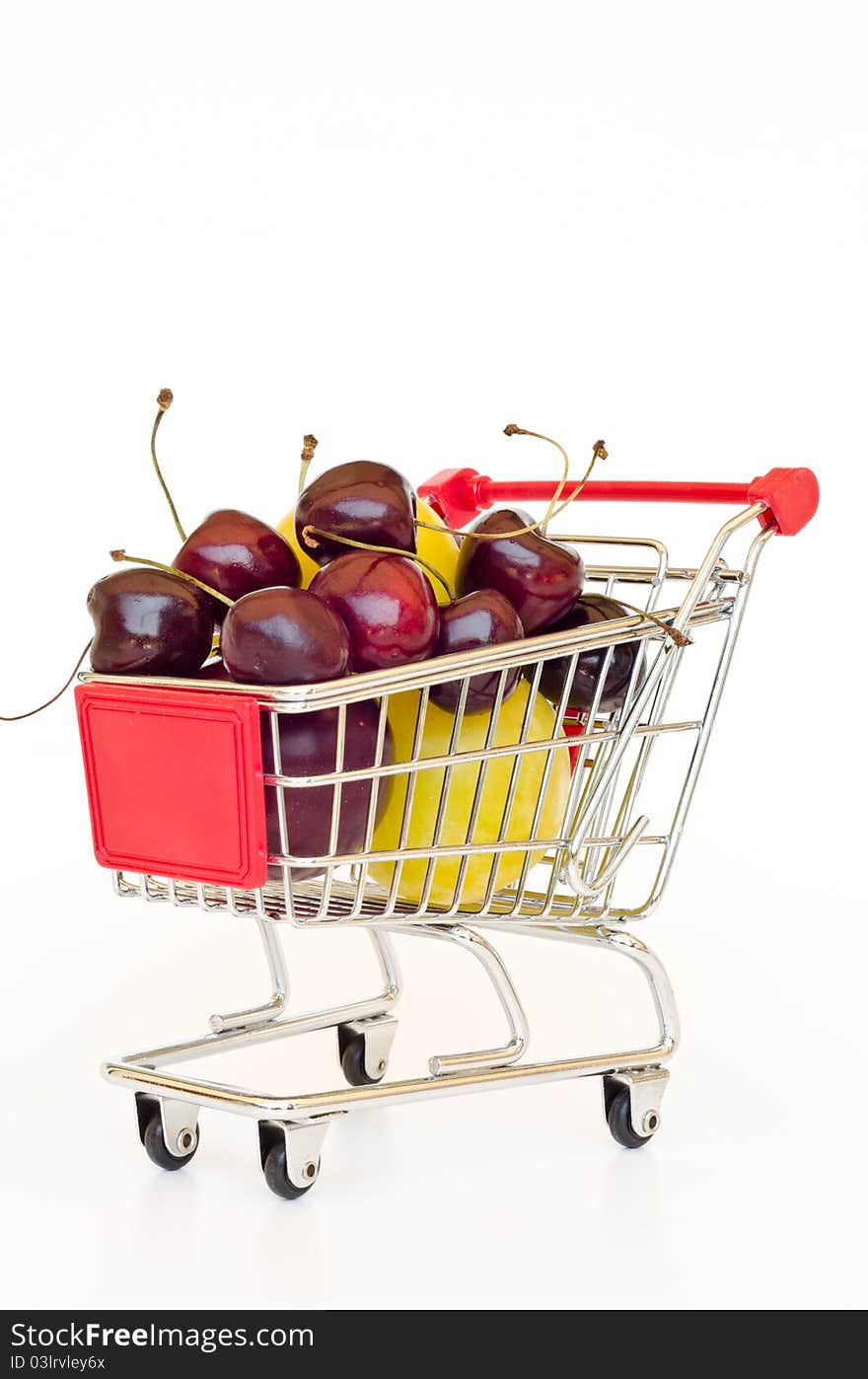 Shopping cart with plum and cherry