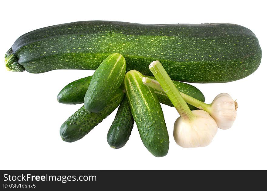 Cucumber garlic zucchini isolated on white