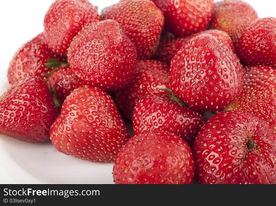 Ripe strawberries on white background