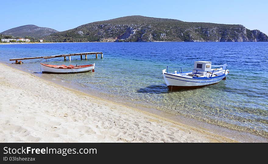 Wooden old dam and boats. Wooden old dam and boats