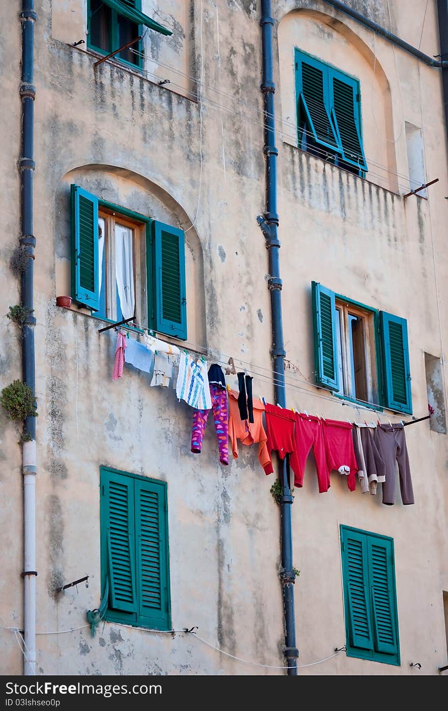 Clothes hanging above an Italian palace