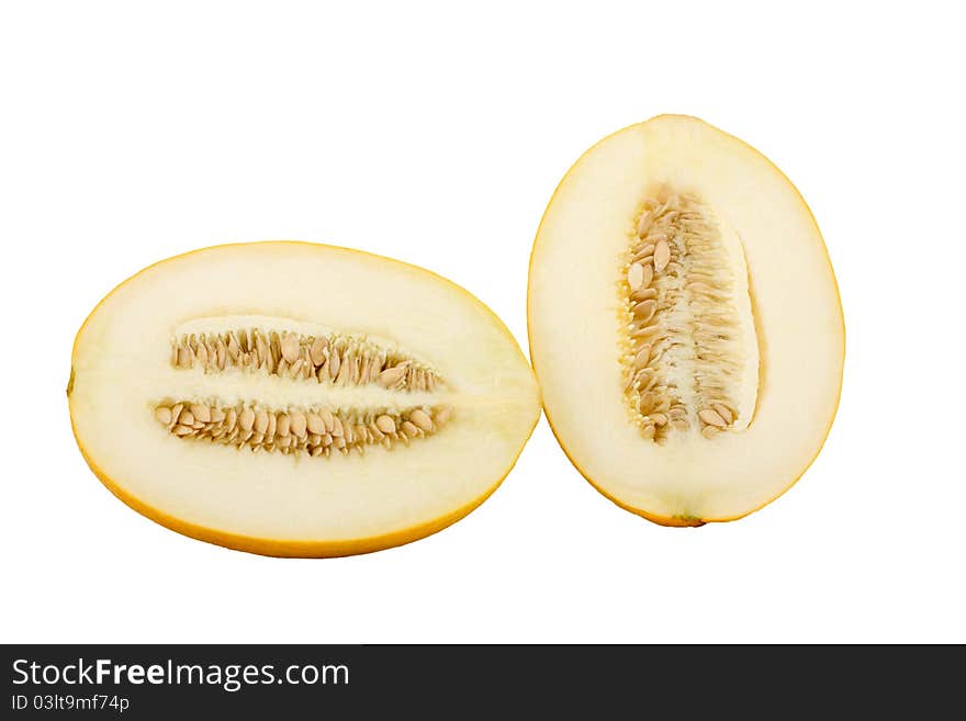 Cut melon half isolated on a white background. Cut melon half isolated on a white background