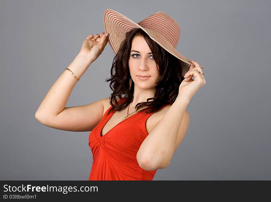 Portrait of a pretty girl in straw hat