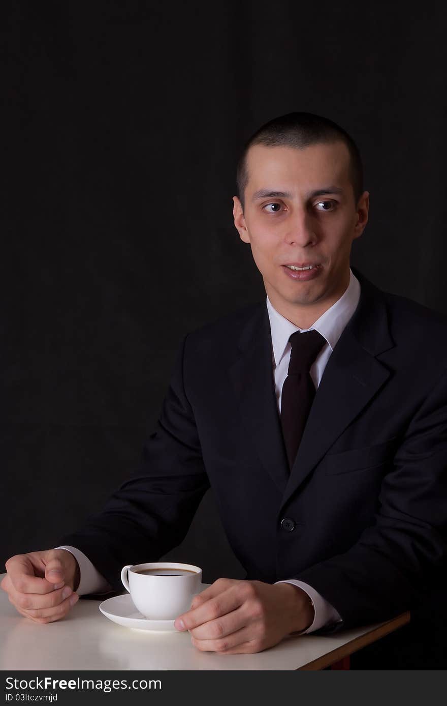 Businessman drinking coffee