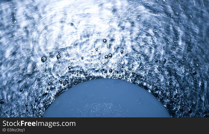 Bubbles in blue water with circle. Bubbles in blue water with circle