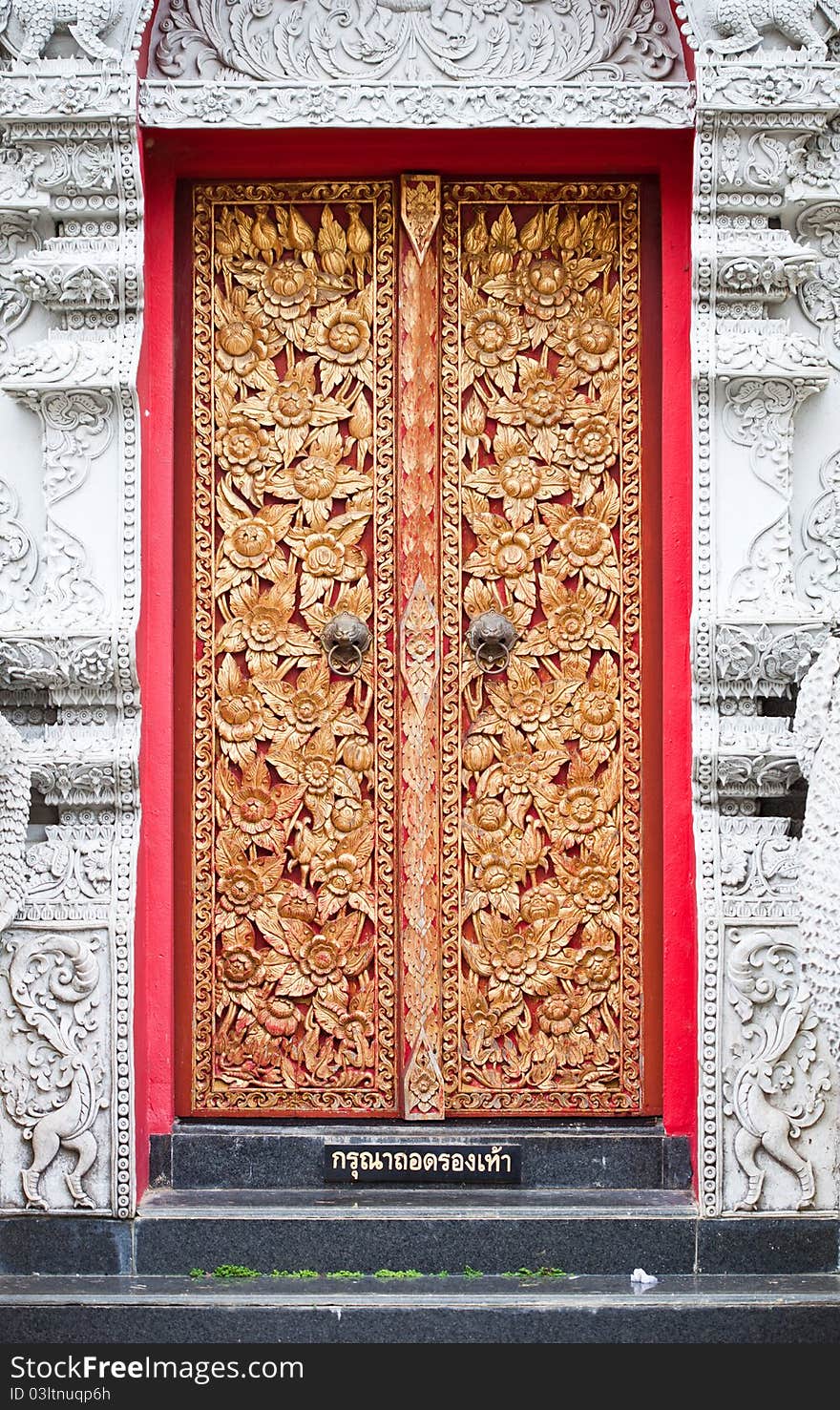 Thai door in temple at thailand