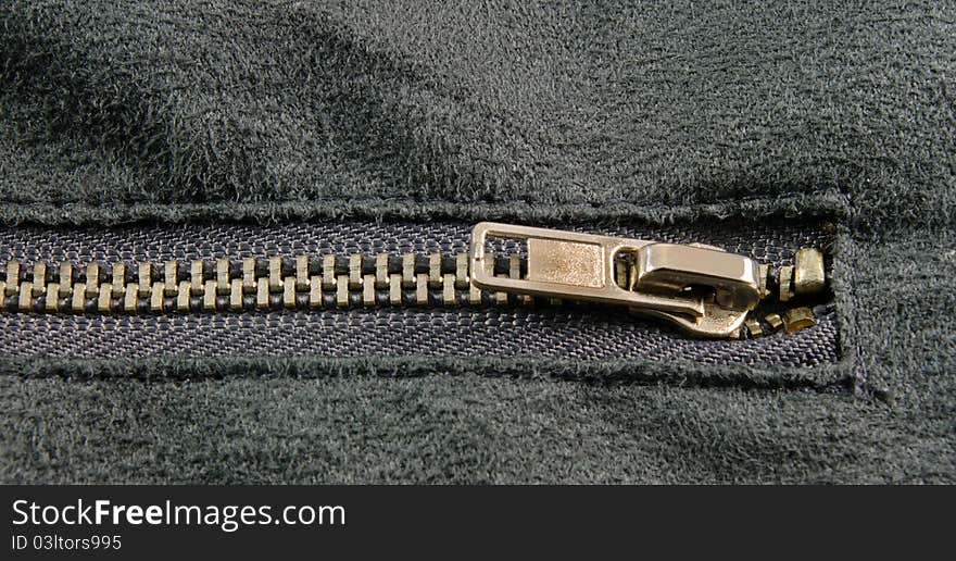 Zipper closeup on grey cloth