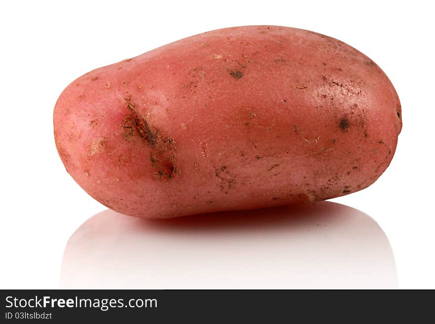 Potatoes in the studio on a white background with reflection.