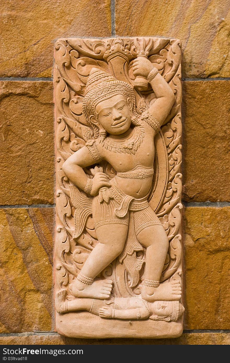 Handicraft on brick wall at Thai temple countryside of Thailand