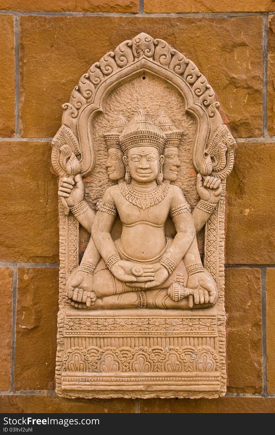 Handicraft on brick wall at Thai temple countryside of Thailand