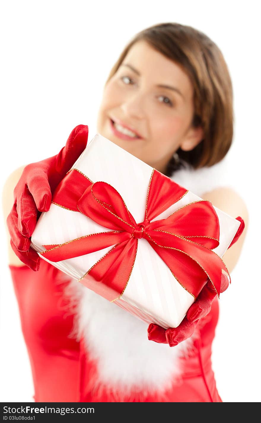 Beautiful woman showing a gift. Beautiful woman showing a gift