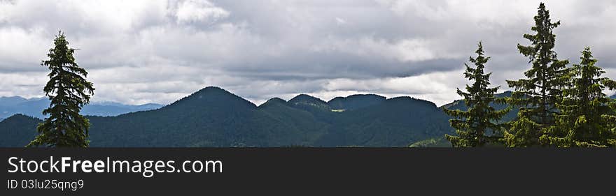 Panorama background in Carpathians. Beautiful montains and landscape in Romania.