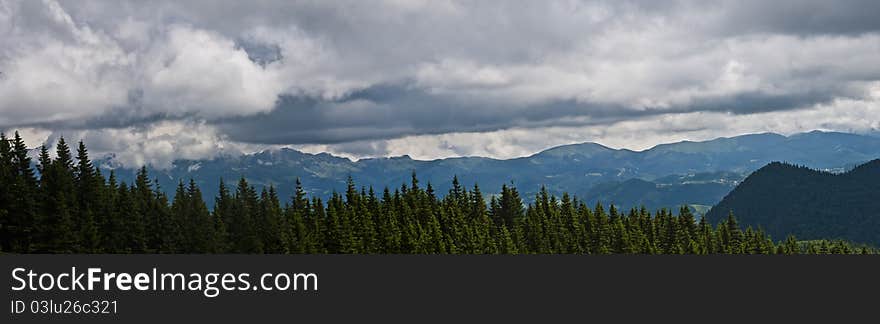 Panorama background in Carpathians. Beautiful montains and landscape in Romania.