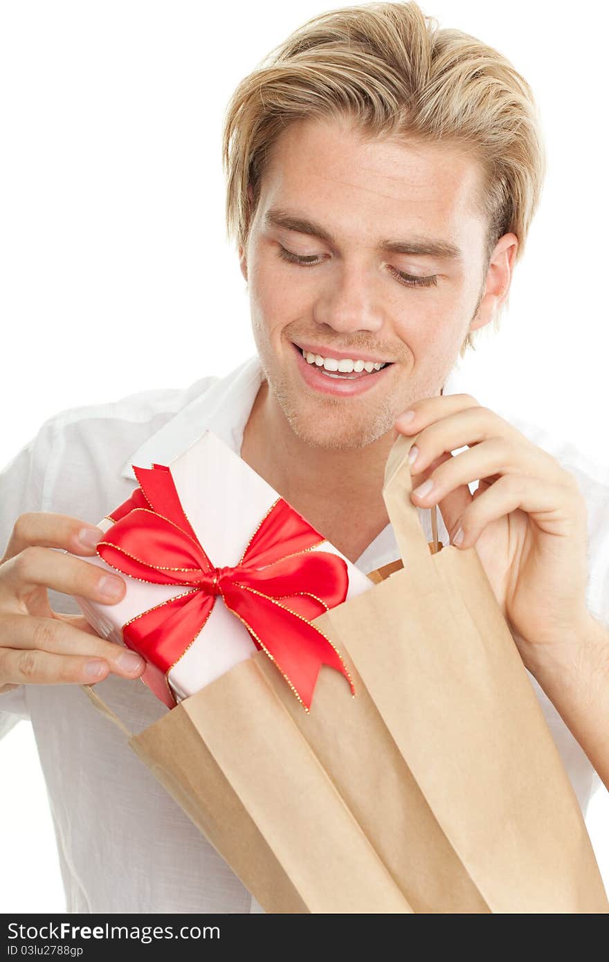 Blond man looking in his bag