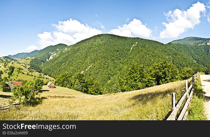 Panorama background in Carpathians. Beautiful montains and landscape in Romania.