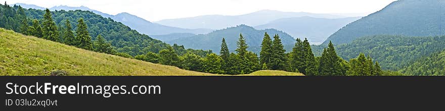 Panorama background in Carpathians. Beautiful montains and landscape in Romania.