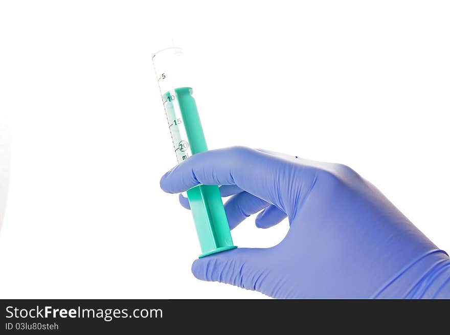 Syringe and rubber glove with hand