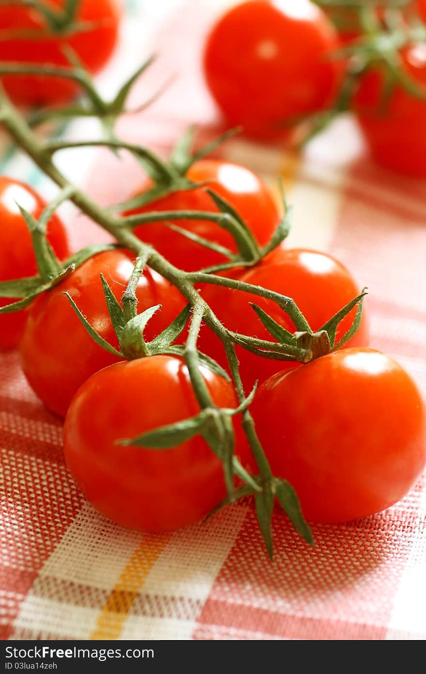 Fresh cherry tomatoes on napkin