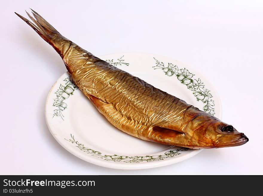 Color photo of a herring on dish. Color photo of a herring on dish