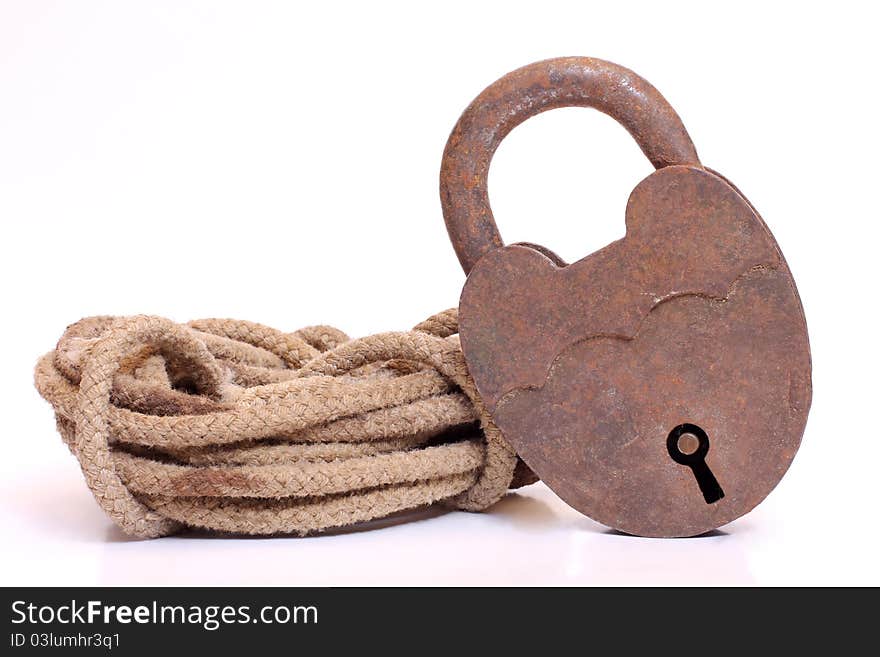 Color photo of coils of rope and a lock. Color photo of coils of rope and a lock