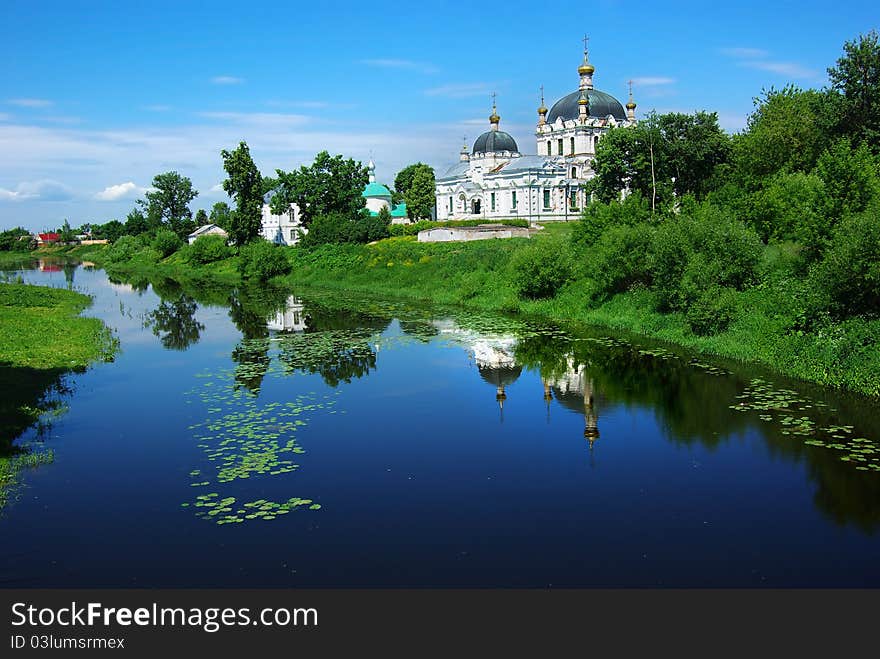 Picturesque Russian landscape with church.