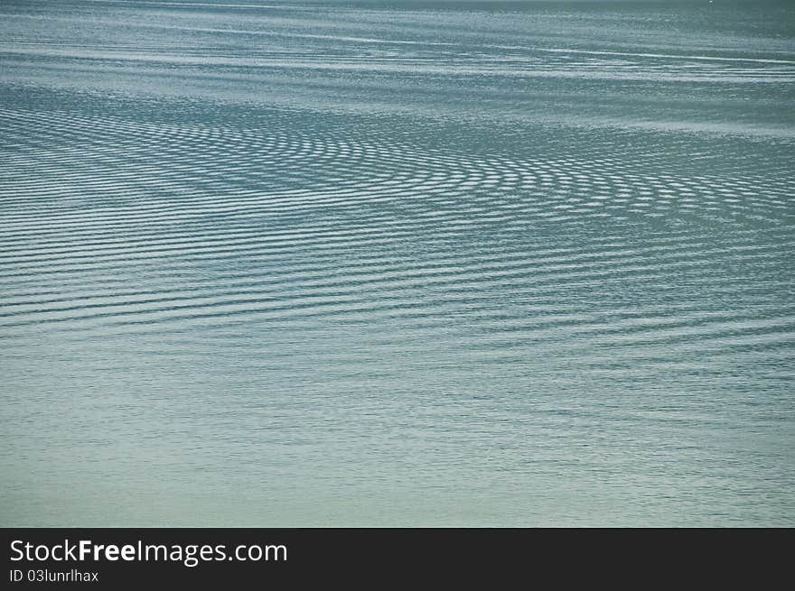 A wave from many boats in the lake. A wave from many boats in the lake.