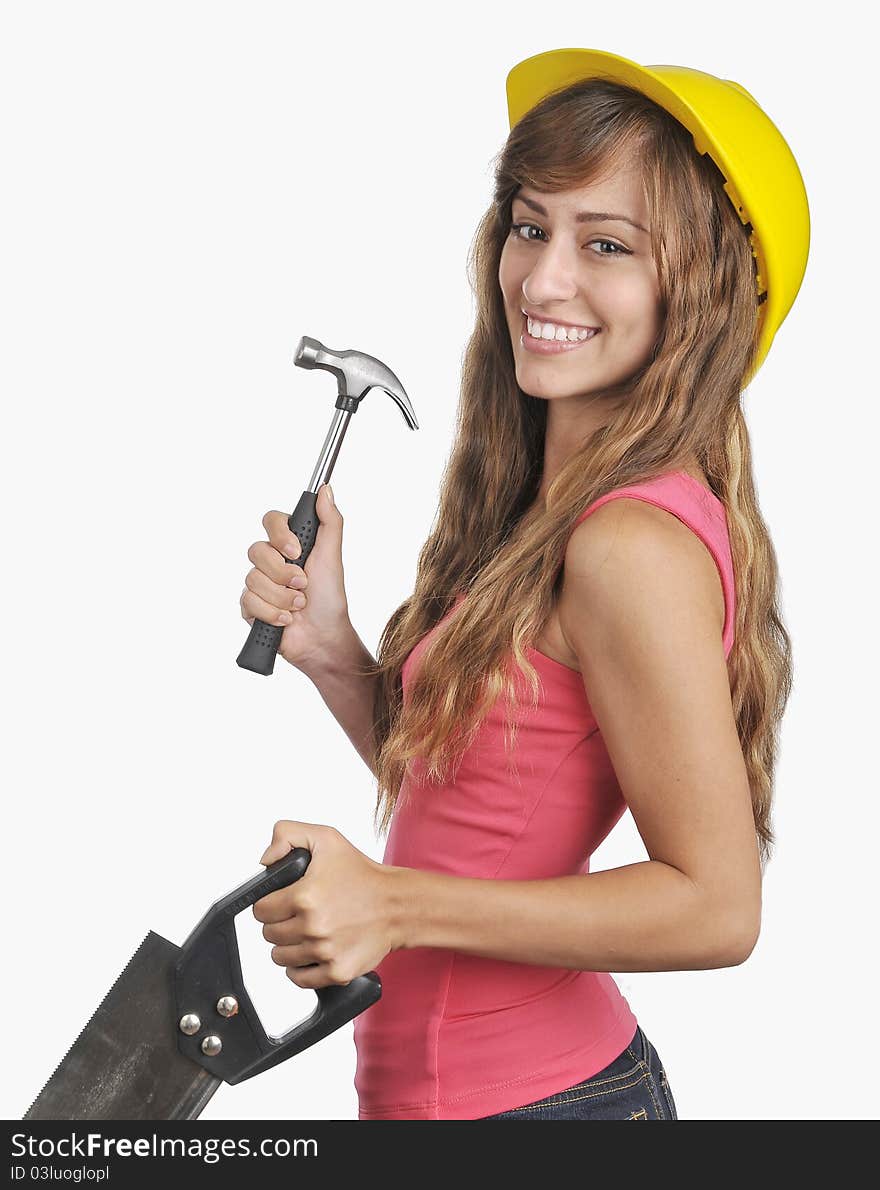 Portrait of a Young Lady with a hard hat saw and hammer. Portrait of a Young Lady with a hard hat saw and hammer