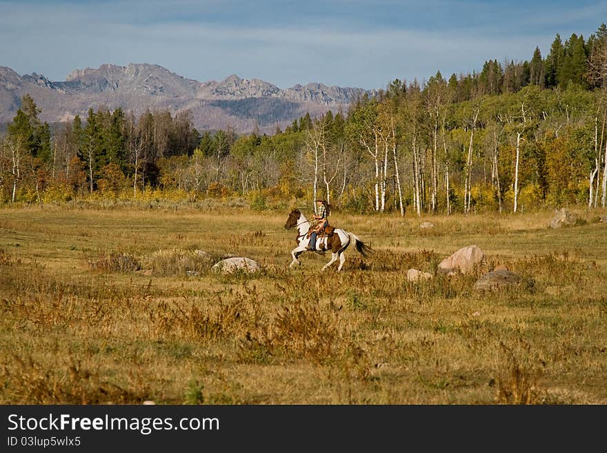 Woman Riding Horse