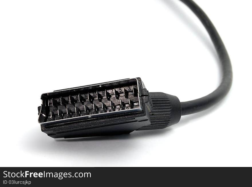 An isolated scart plug on a white background