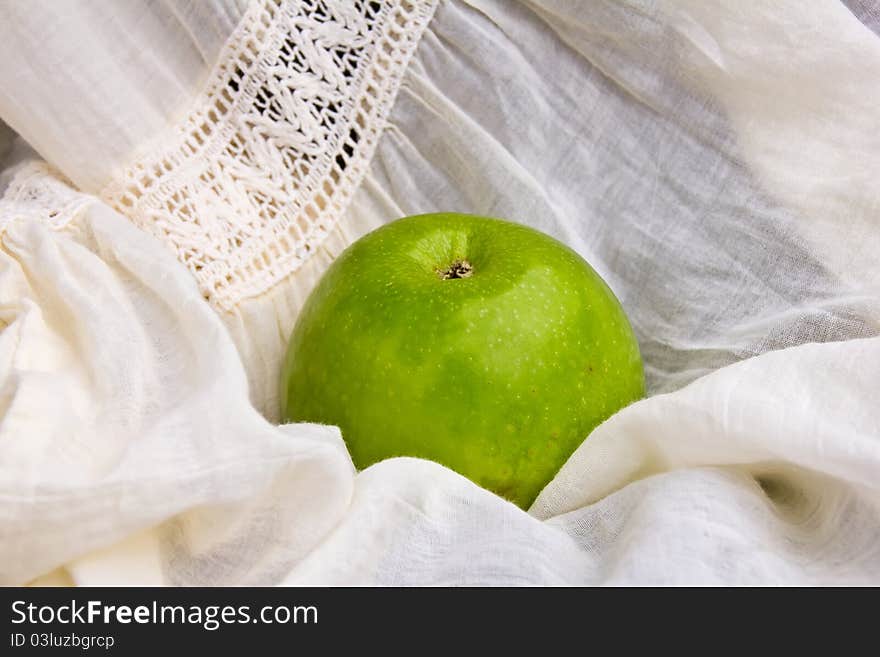 Green apple on the cotton