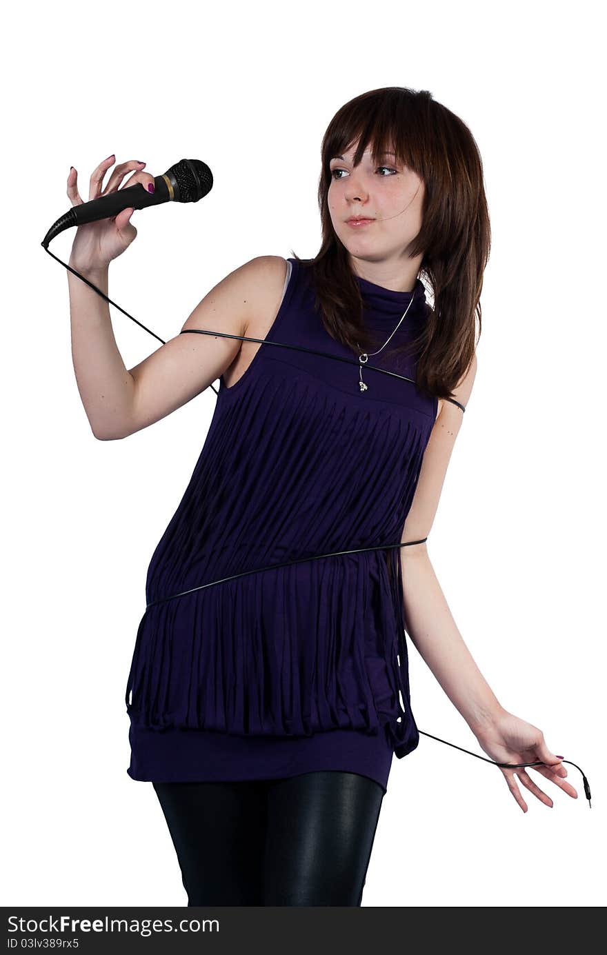 Cute girl wrapped in cord microphone on a white background. Cute girl wrapped in cord microphone on a white background