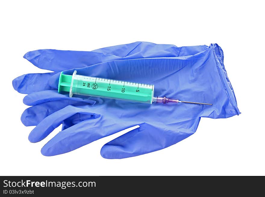 Syringe and gloves of a white background. Syringe and gloves of a white background