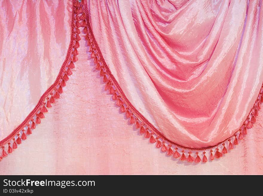 Details of pink curtain with tassels. Details of pink curtain with tassels