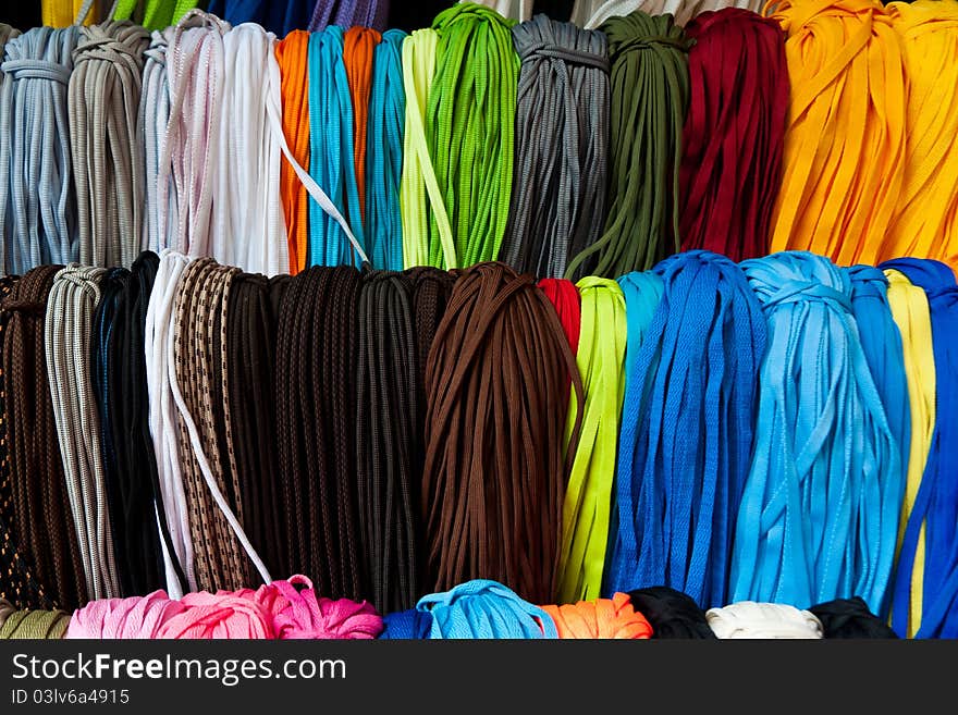 Colorful shoelaces hanging for sale