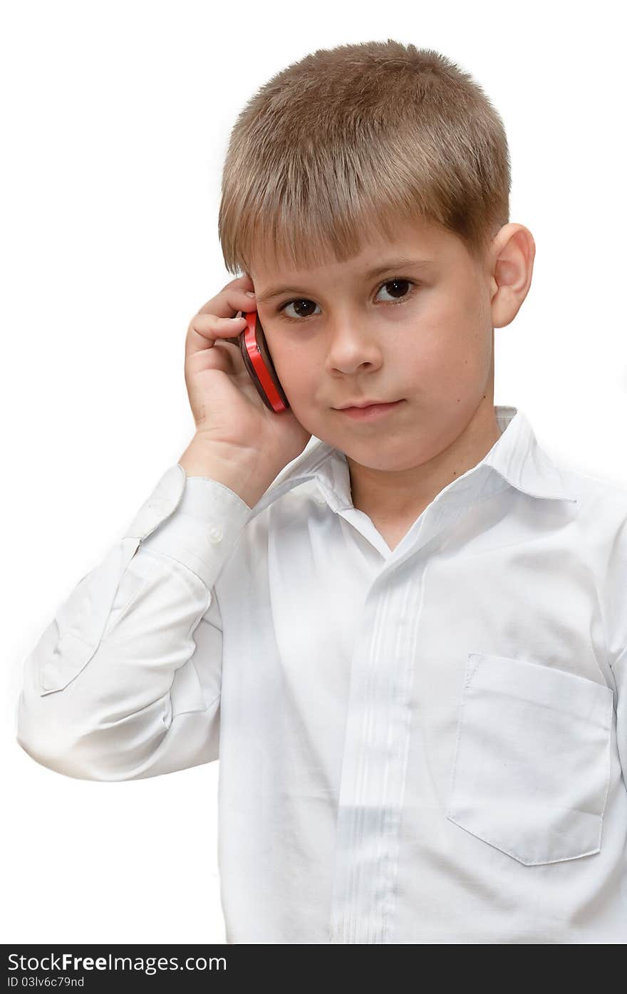 A boy with a cell phone. Isolated on white background