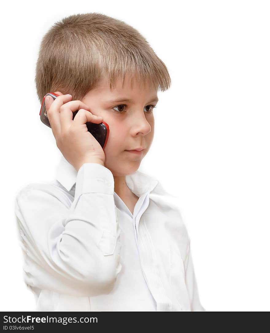 A boy with a cell phone. Isolated on white background